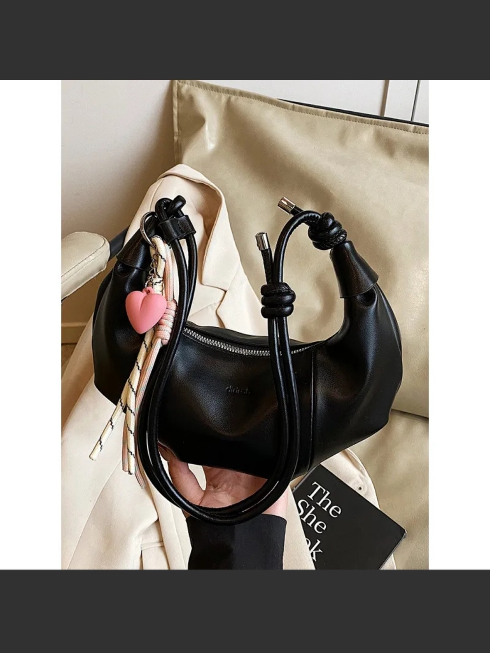 Black Shoulder Bag with Knot Handle and Pink Heart Charm
